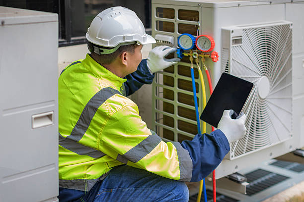 Professional Air Duct Cleaning technician working in Dunlap, IN